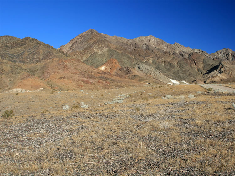 We explore several old trails that radiate eastward from the spring site.  This is a view to the north of the Pleasanton Mine area taken from one of the trails.