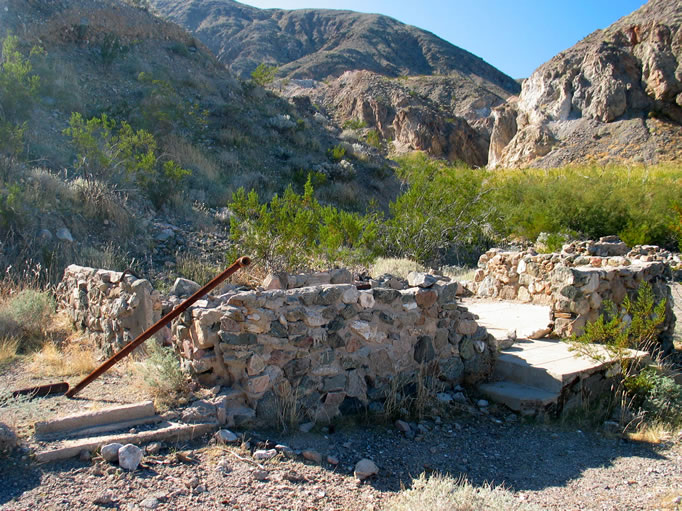 The rock foundation you see here is all that remains of the snug cabin built in 1933 by Adelina and John Smith.
