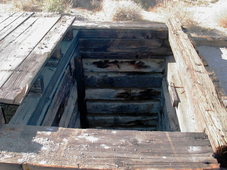 Nearby is the well timbered and very deep shaft of the Black Metal Mine.