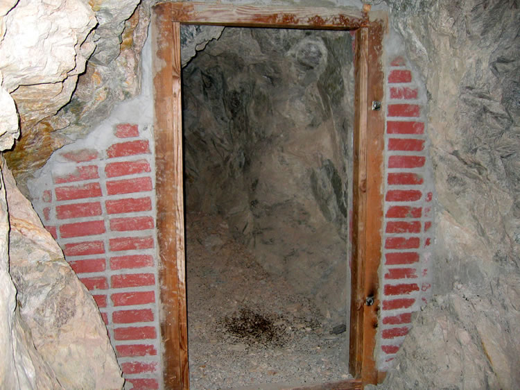 We have no idea why this short dead end tunnel is bricked up.  The brick doesn't seem substantial enough to create a secure powder magazine.  Another mine mystery!