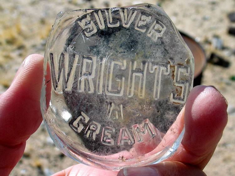 Numerous interesting bottle fragments turned up as we prowled through the trash piles.
