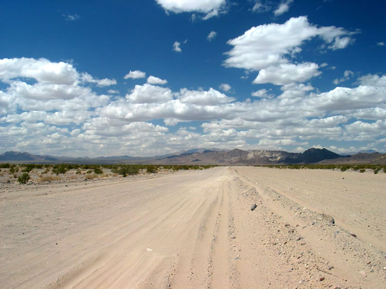 As we continue north to Cadiz and pavement we can't help but photograph the puffy clouds and expansive beauty of this area.