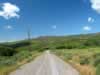 Heading down Black Star Canyon Road with the Santa Ana Mountains in the distance. (71kb)