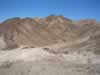 Looking down from the collecting area at the road leading to the American Girl Mine. (67kb)