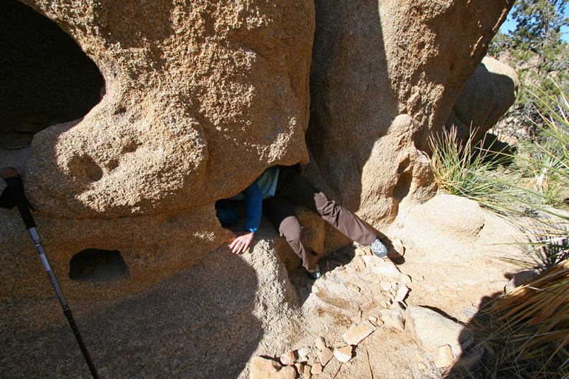 The second is that there are lots of eroded pockets in the cliff that just beg you to try to climb into them.