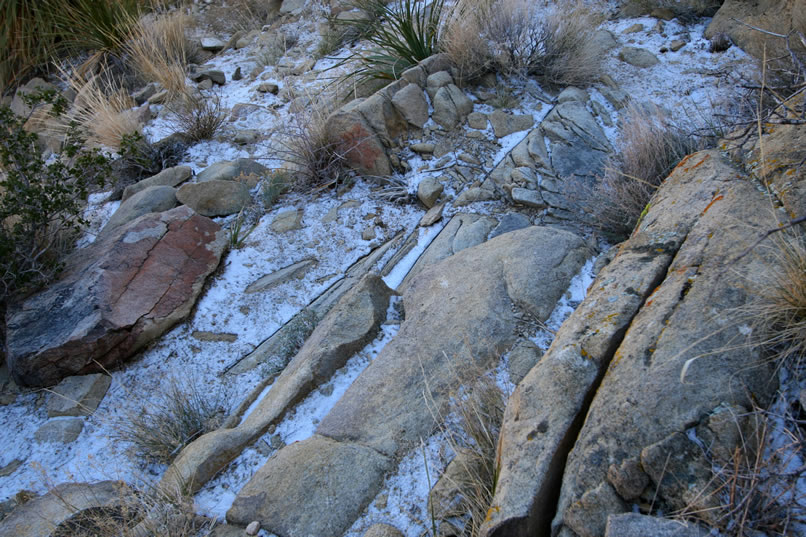 More snow adds an extra element of slipperiness, just what we don't want for the last drop down to the flat area. 