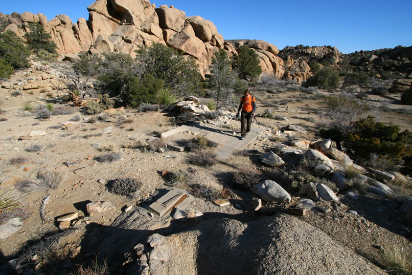 A bit further along we leave the wash to hike up to an old tailings pile that we spy up a side canyon.  Just below the tailings pile we come across what looks like the remains of a little mill site.