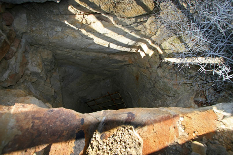The shaft above the tailings pile has been grated.