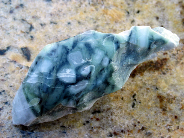 Tri-color marble found at the Sidewinder Quarry.