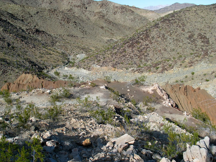 A nice view of the distinctively colored tailings clinging to the steep slope.