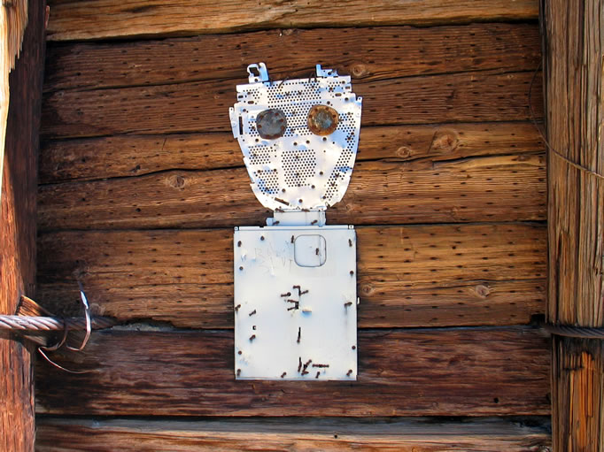 The writing on this eclectic piece of "art" says "Robot Slut."