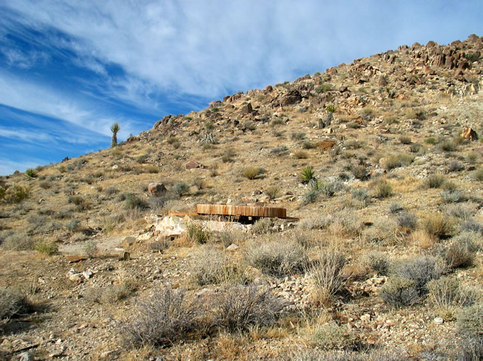 The stone foundation and partially restored wheel can be seen here.