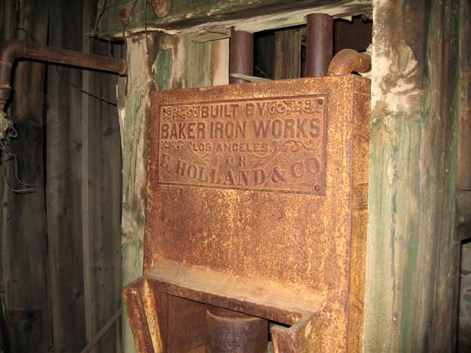 The builder's plaque above the two stamp battery.  Each stamp, which pulverized the ore, weighed 850 pounds.