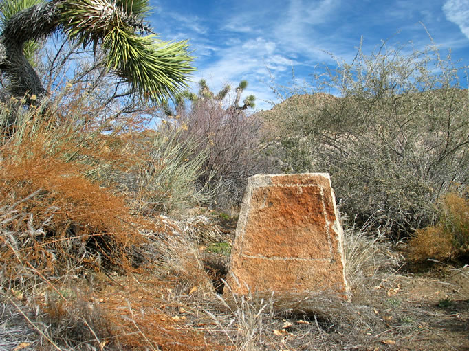 One of the gravestone blanks that Keys kept handy.  This is east of the mill near a low rock wall that might have been built from the stones of an old arrastra that Tulley, the previous owner of the property, had built here.