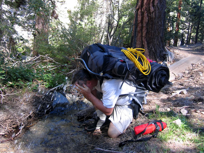 Chris cools off.  Notice his "Pack bulky, pack heavy" philosophy!