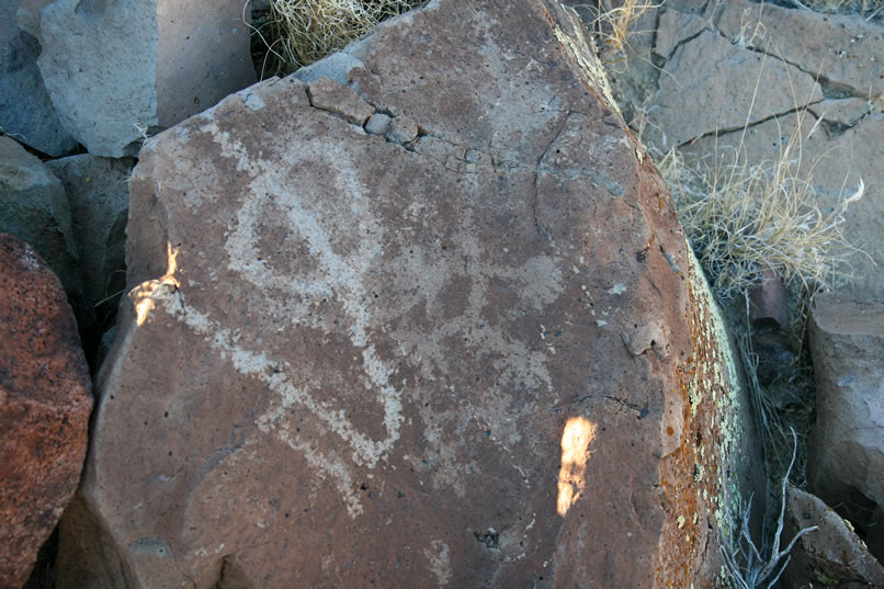 As we wander over to photograph this little digitate anthropomorph that we missed, we notice some really nice petros higher up on the sides of the wash that we also had overlooked before.