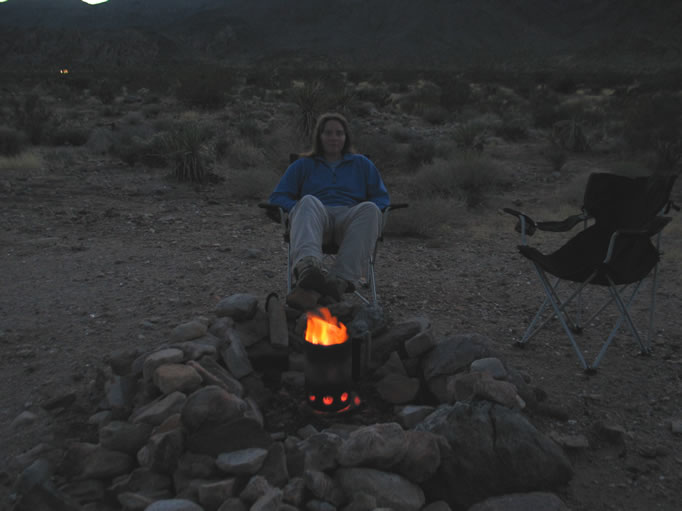 We set up camp just outside the park boundary and enjoy some spicy sizzling sausages under a full moon.