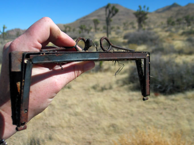 The frame and clasp portion of a purse.