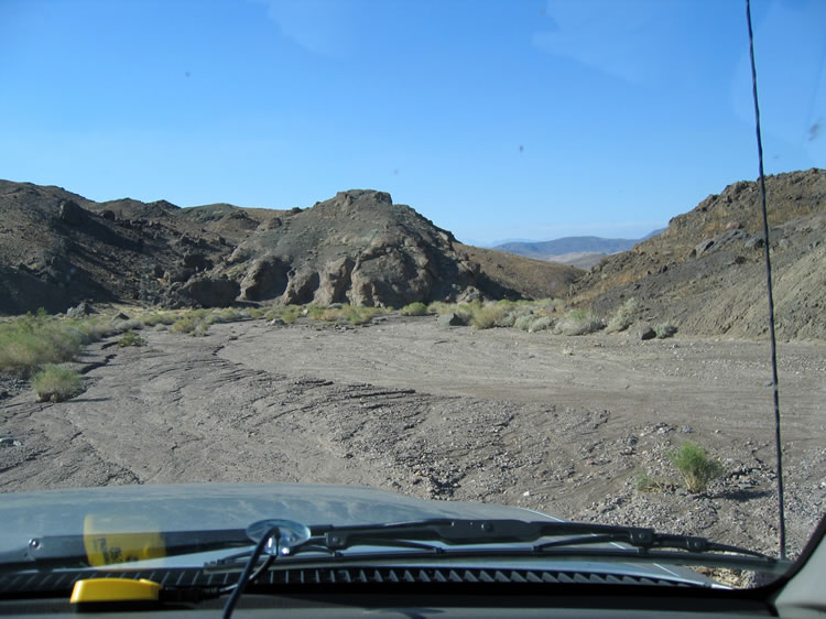 If you can't see the road, it's because it's gone.  We just followed the wash and kept on course by using our laptop with its GPS receiver to show our location.