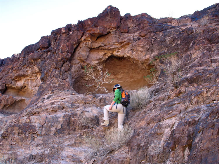 Further up the canyon are some less accessible shelters.  Mountain goat Niki checks out this one.