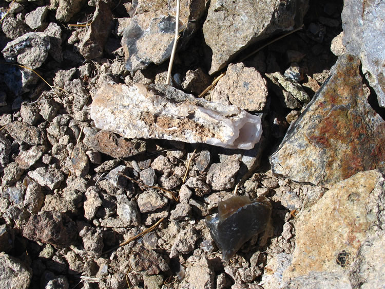 A roughly shaped tube of chalcedony is found but it doesn't seem to match the more delicate tube agate that we're after.