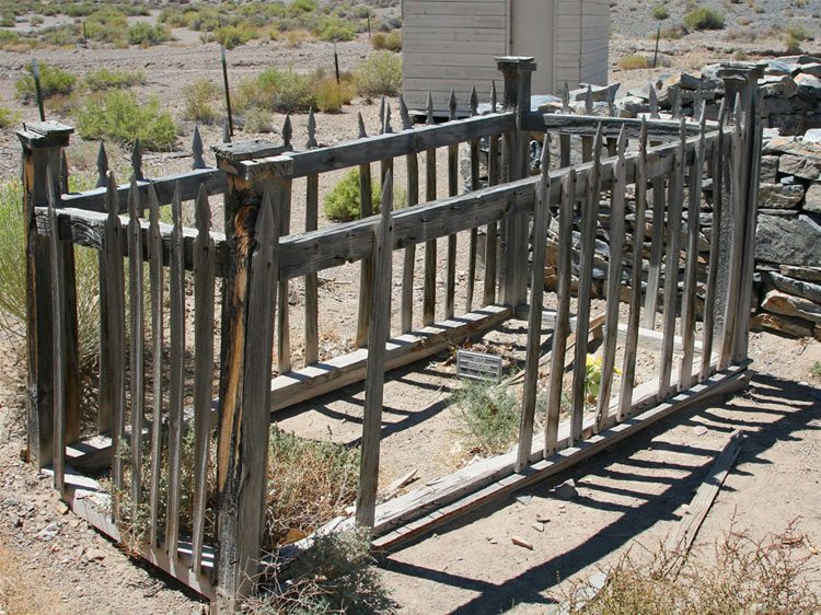 One of the historic grave sites with a rock walled site behind it.