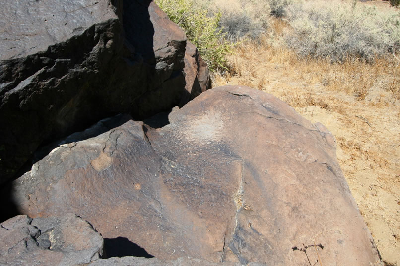 There's also a small grinding slick on one of the adjacent boulders.  