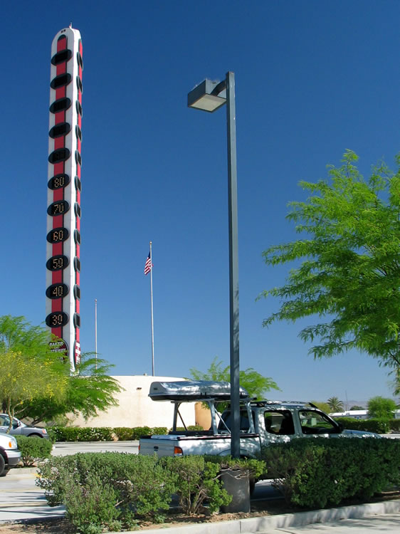 The Lizardmobile relaxes in the shade while we wait for Dezdan to join us at our early morning rendezvous spot under the thermometer in Baker.