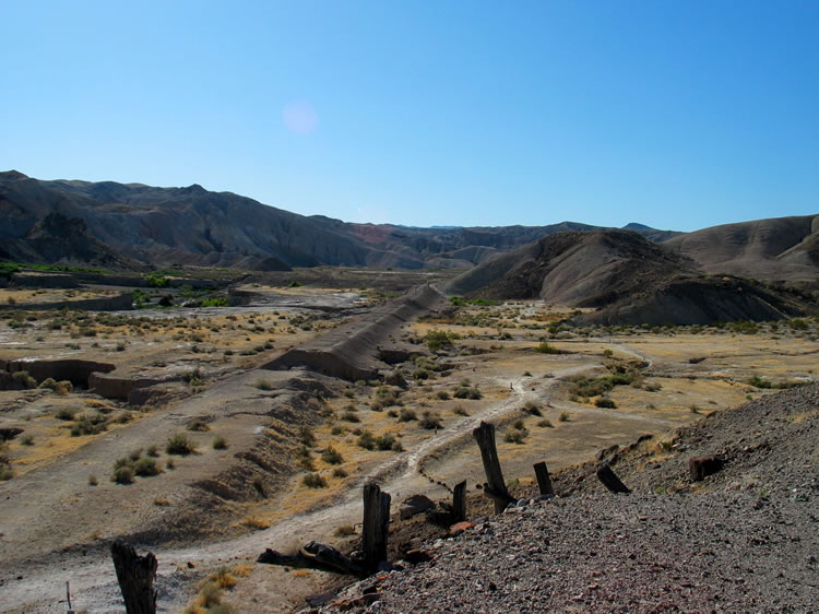 A view down to the heavily eroded Tonopah & Tidewater Railway roadbed.