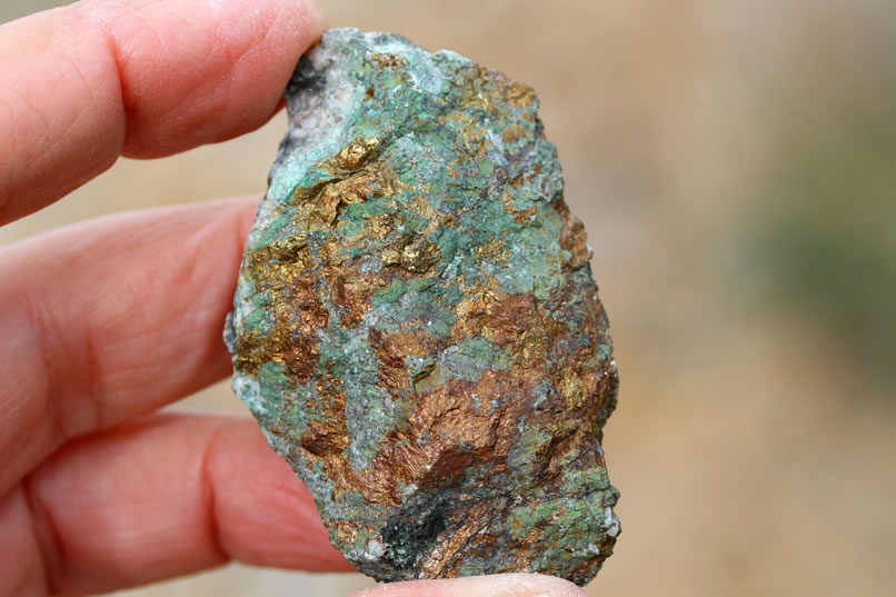 We notice that several of these rocks are mottled with chalcopyrite.
