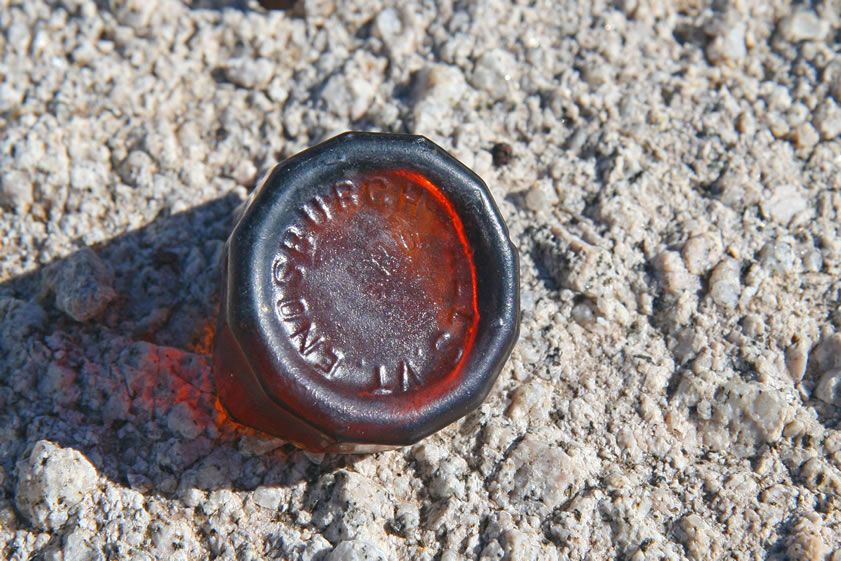The base of this old bottle is embossed with the words "Enosburgh Falls, VT."  We did find that a tonic, Dr. Green's Blood Purifier and Tonic, was stamped with the exact same information.