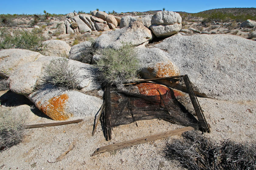 Another old bed frame with woven wire mattress.