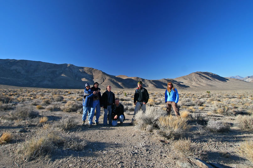 Back at our vehicles we take a group shot with the Dutton Range and the Ulida Mine in the background.