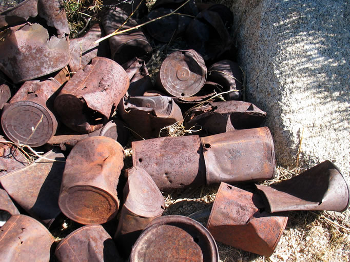 As you can see by the soldered caps of some of the cans, this can dump is far from modern.