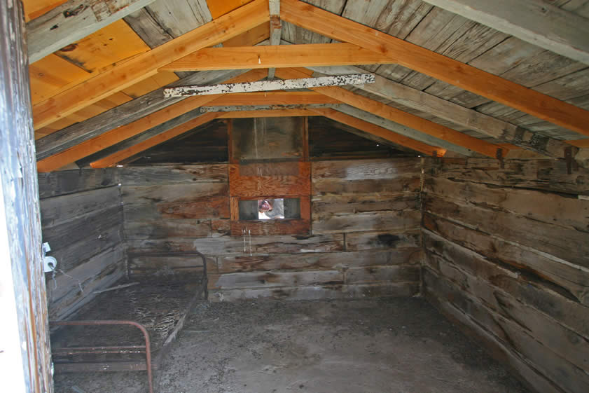 The cabin interior with some crazy desert girl looking in the back window!