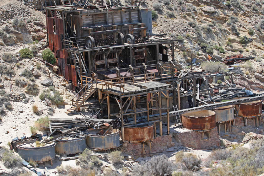 In this close-up view, you can clearly see the two Hendy five-stamp batteries of 1,050 pound stamps and the single five-stamp battery of 1,300 pound stamps built by the Union Iron Works.