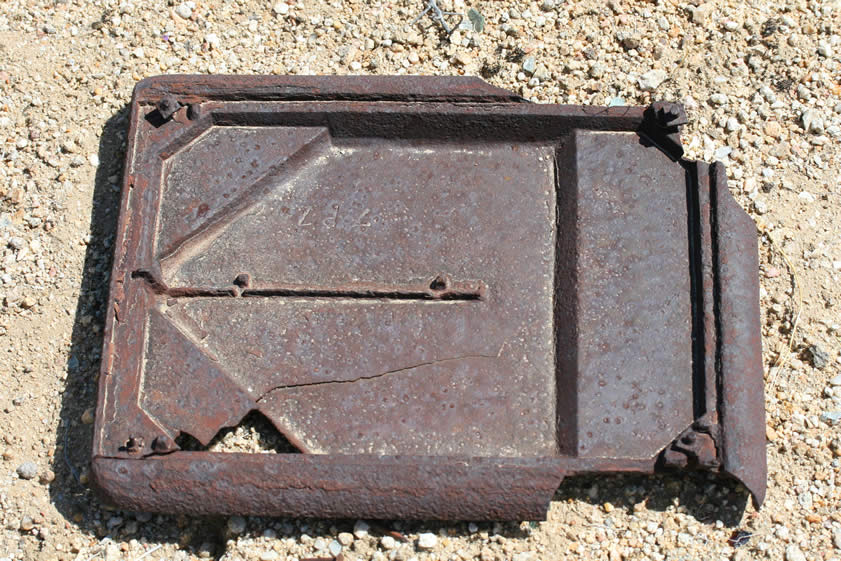 Part of a heavy cast iron stove.