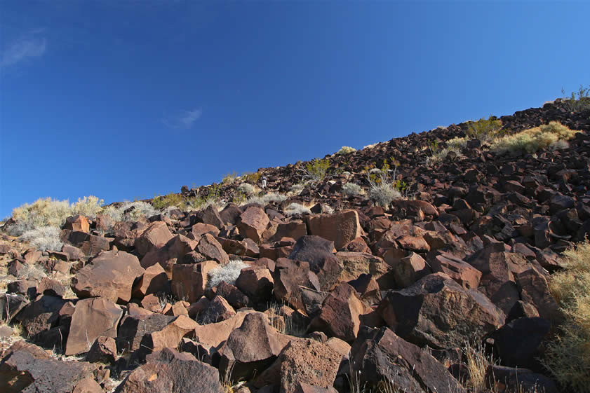 Niki has spotted a large, very distinctive boulder a couple of hundred feet up the slope.  You can just see her in the middle of the photo if you look hard.  She's about halfway up and the scrambling is difficult.