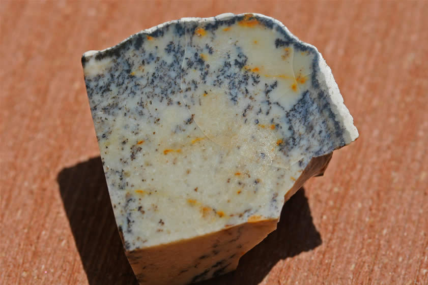 On the other hand, the chunk of common opal that Jamie found looks pretty much the same polished as it did when she first found it.