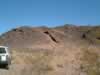 There were several barite mines as the powerline road meets the hills. (67kb)
