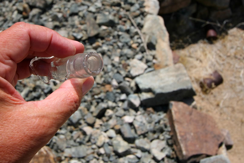 Jamie finds an old bottle neck.