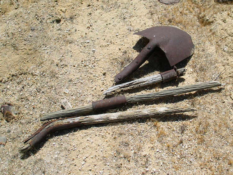 We collect several scattered shovel parts and get them to pose for us.