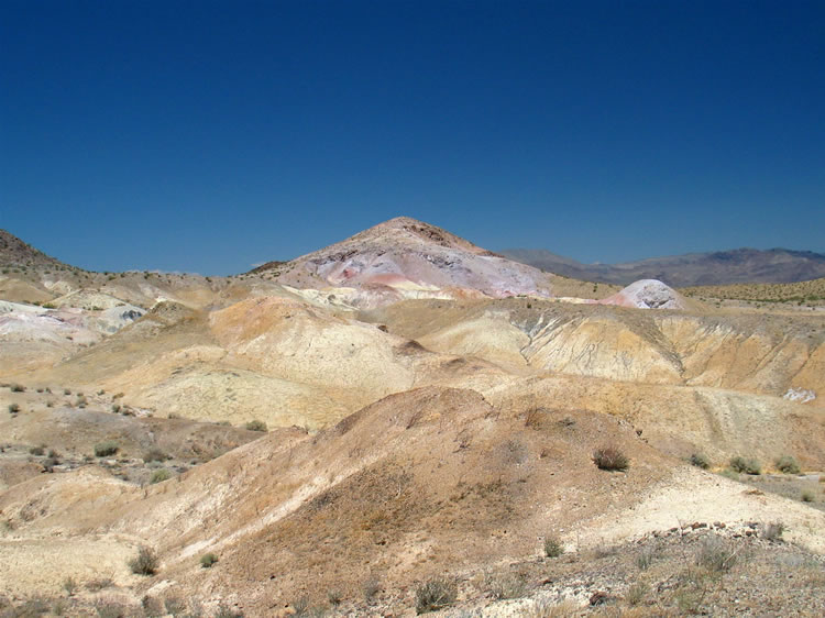 This turns out to be a good idea for two reasons:  First, it's an incredibly colorful and scenic area; and second,  we find out where that crumpled metal thing that we found earlier came from.