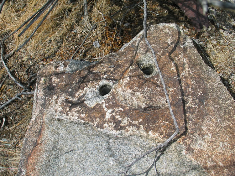 This one has holes where a fitting could have been attached.