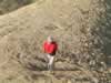 Hiking up the mud hills. (175kb)