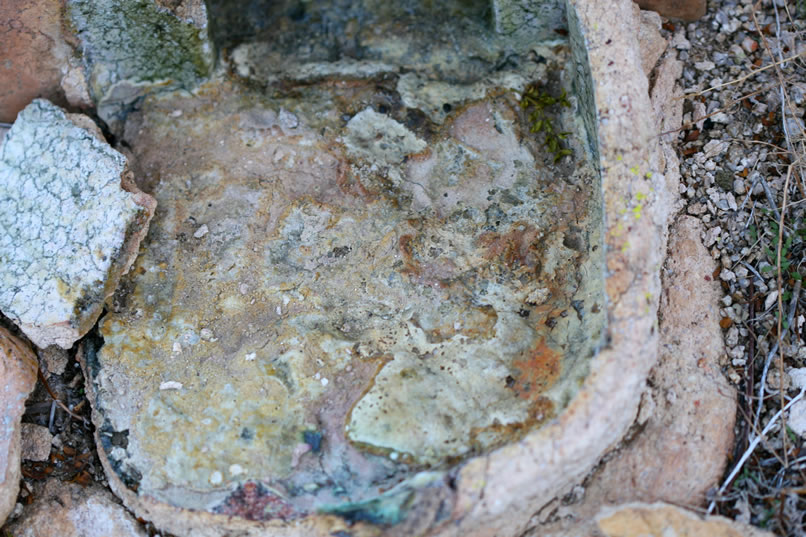 The accumulation of slag shows that the furnace saw heavy use doing assay work.
