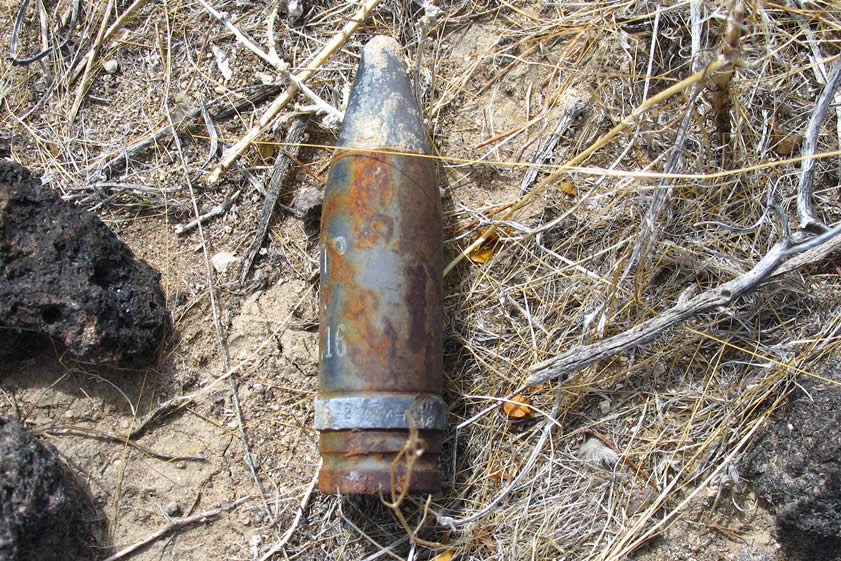 Our military escort cautions us that the collecting area is also strewn with debris from an old aircraft wreck that took place here.