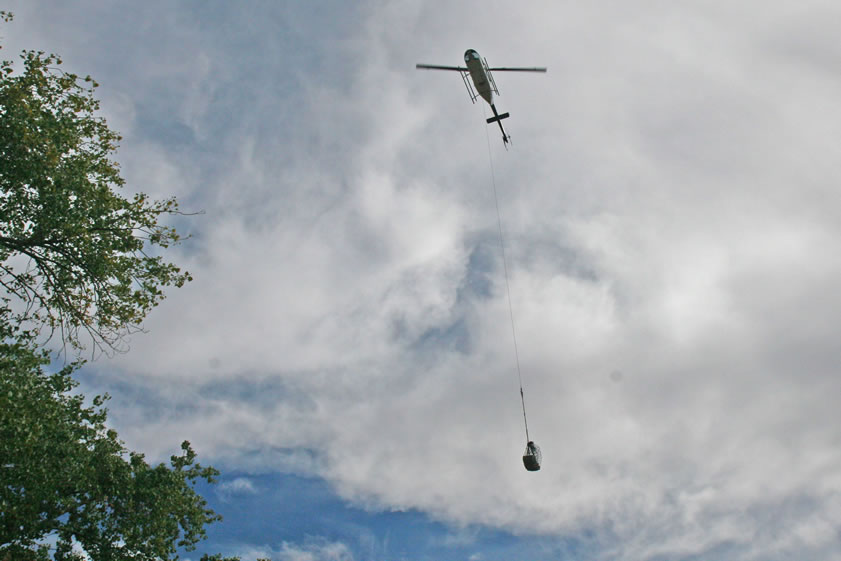 A little added excitement in the village comes from the constant trips being made by the helicopter.  It's carrying down sacks of cement and building supplies for the new cultural center that's being built.
