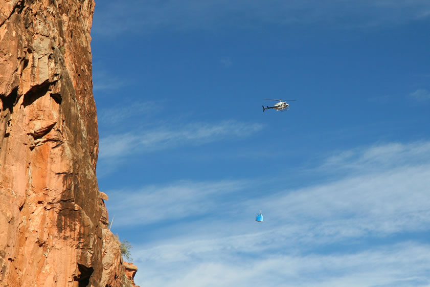 A simple walk down to the toilets this morning turns into quite a show!  That's right, flying porta-potties!  We couldn't help but document this little slice of life in Havasu Canyon.