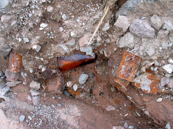 The wash above the outhouse was full of debris consistent with mining, as you can see here.  We were out of time and really needed to start back or we would have explored further.